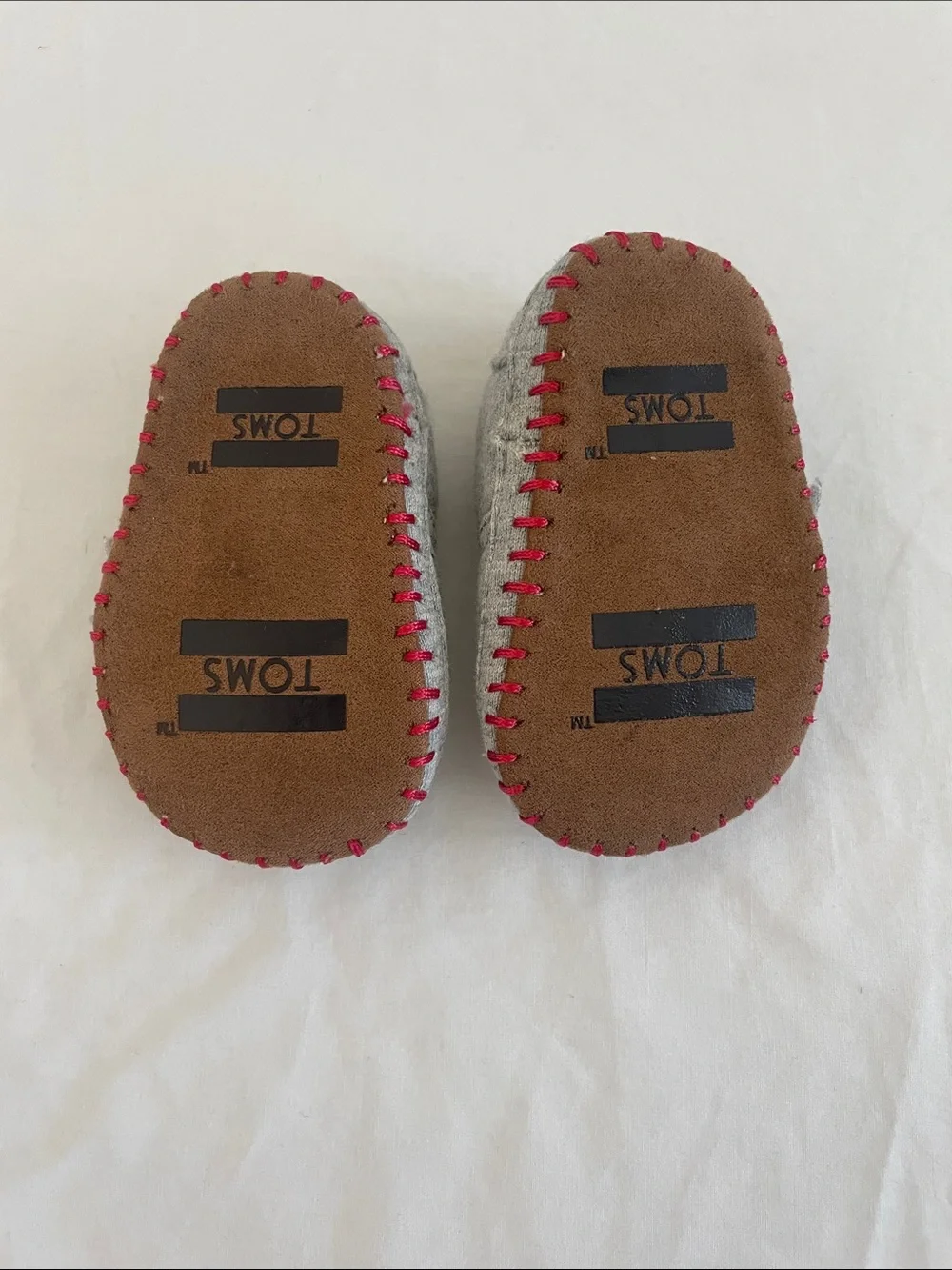 Toms Grey Slip-On Baby Shoes with Red Accents and Rooster Stitch (NWOT) size 2